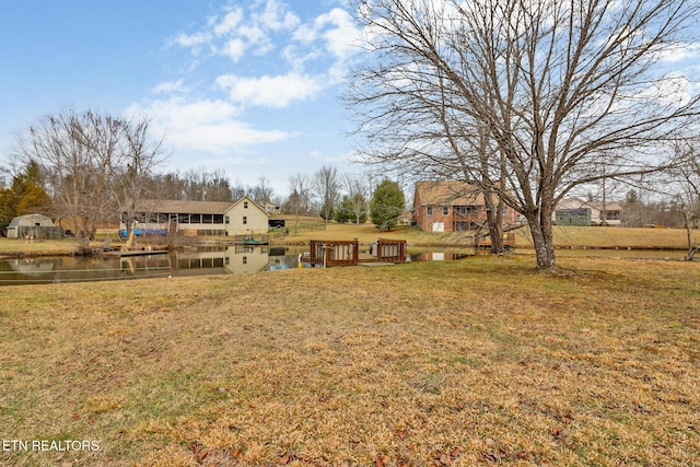 view of yard with a water view