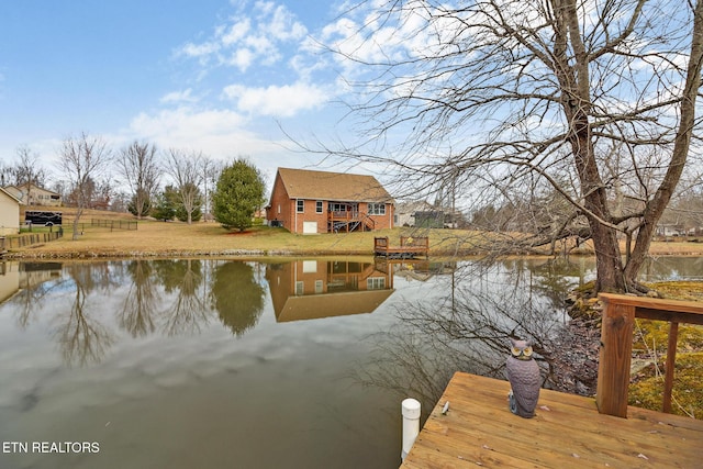 dock area featuring a water view