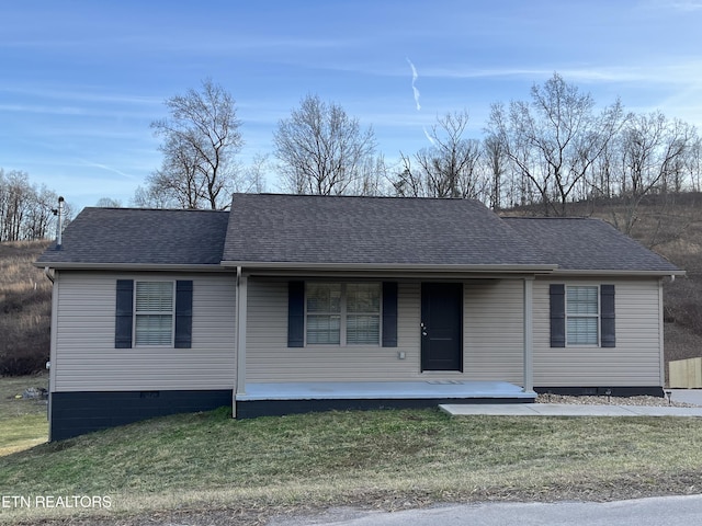 view of front facade with covered porch and a front lawn