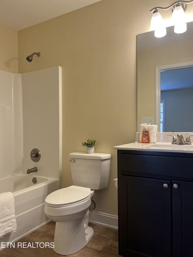 full bathroom with vanity,  shower combination, and toilet