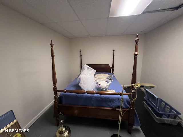 bedroom with a paneled ceiling