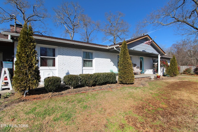 view of home's exterior featuring a lawn