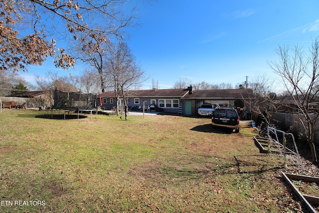 exterior space featuring a trampoline