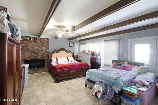 tiled bedroom with beam ceiling, a brick fireplace, and ceiling fan