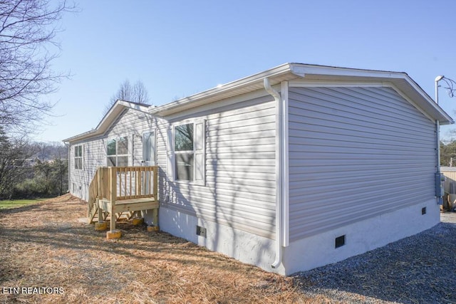 view of home's exterior featuring crawl space