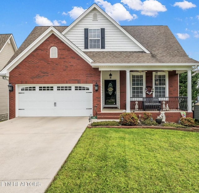 view of front of house with a front yard and a porch