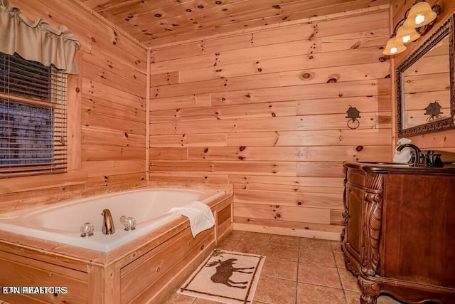 bathroom featuring a tub to relax in, tile patterned floors, sink, wood ceiling, and wooden walls