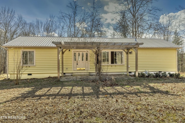 view of front of property with a pergola