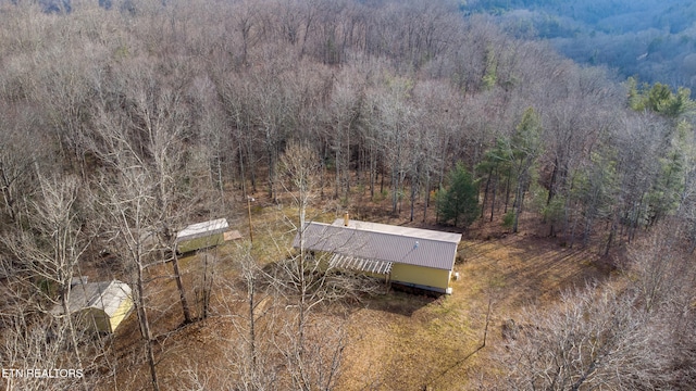 258 Charlie Newberry Rd, Lancing, TN 37770 - aerial view featuring a wooded view