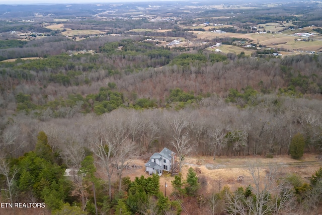 bird's eye view featuring a rural view and a forest view