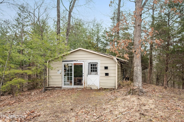 view of outbuilding featuring an outdoor structure