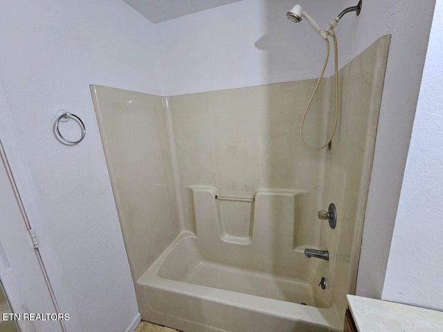 bathroom featuring shower / tub combination