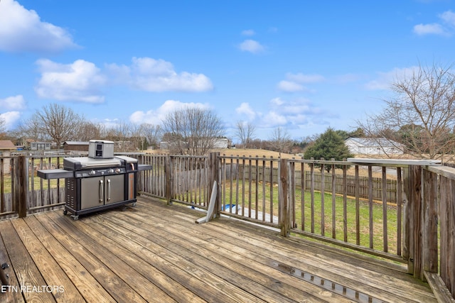 deck featuring a lawn