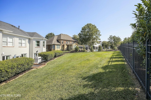 view of yard featuring fence