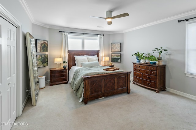 bedroom with visible vents, baseboards, light colored carpet, ceiling fan, and crown molding