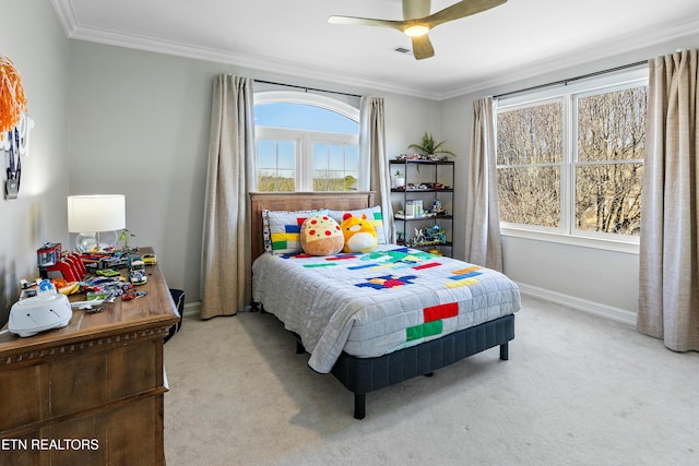 bedroom with baseboards, carpet flooring, and crown molding