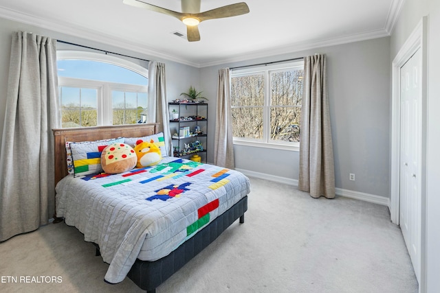 bedroom featuring carpet, visible vents, baseboards, and crown molding