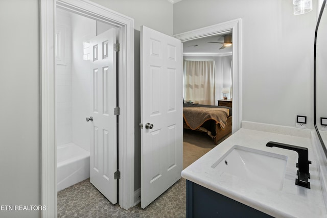 ensuite bathroom featuring vanity and ensuite bath