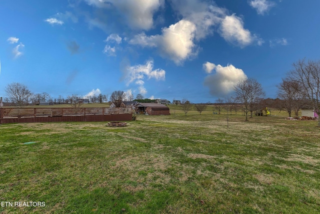 view of yard with a rural view