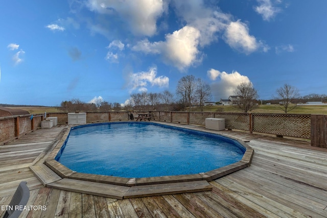 view of pool featuring a deck