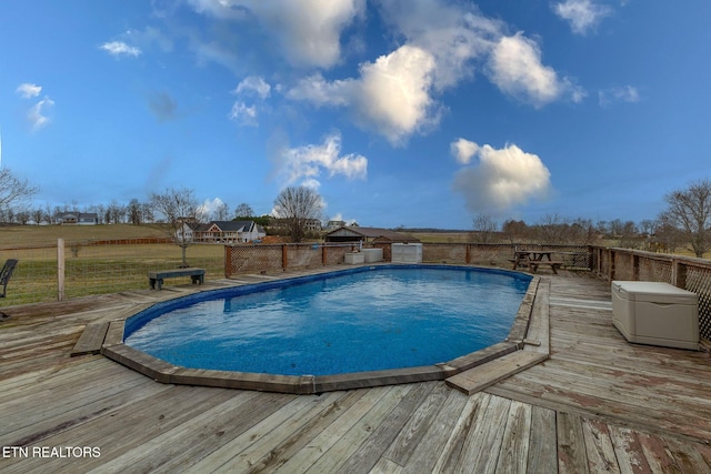 view of pool with a deck