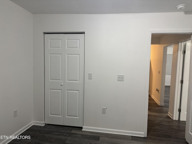 interior space featuring dark wood-type flooring