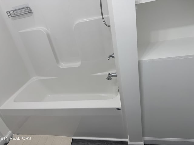 bathroom featuring bathing tub / shower combination