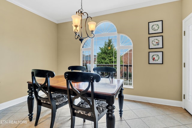 dining area featuring a notable chandelier, light tile patterned floors, and ornamental molding