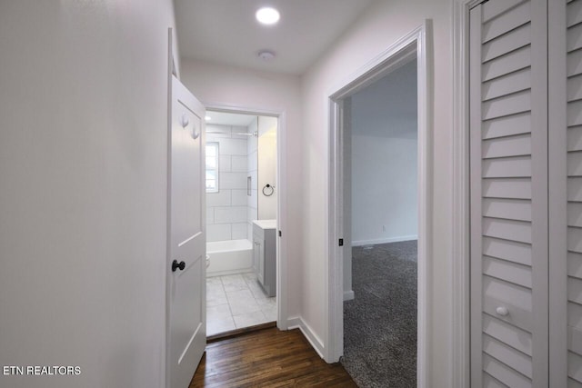 hall featuring dark hardwood / wood-style flooring