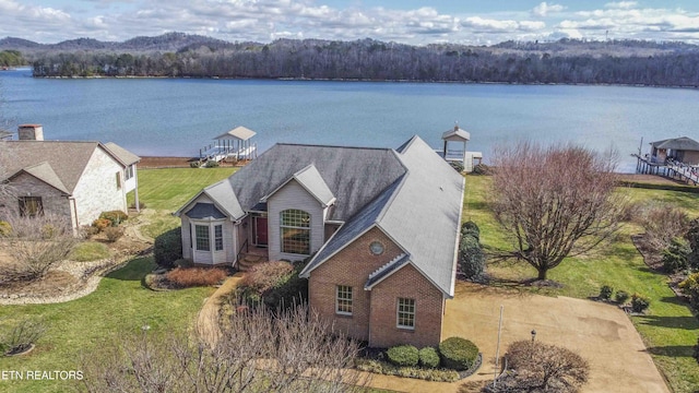 drone / aerial view featuring a water view