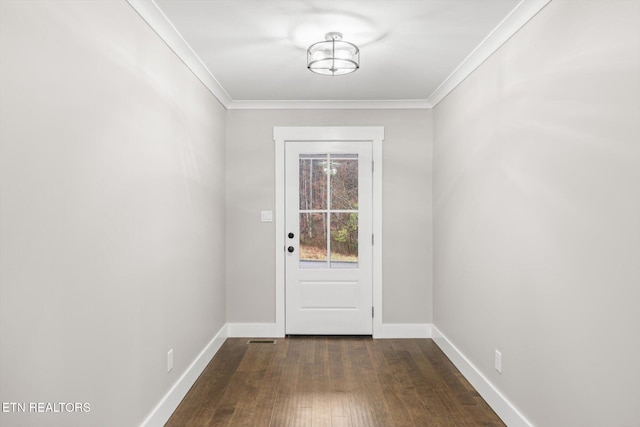 entryway featuring ornamental molding and dark hardwood / wood-style flooring