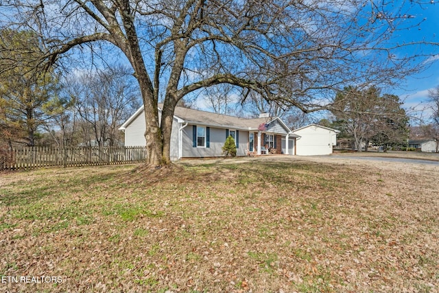 ranch-style home featuring a front lawn