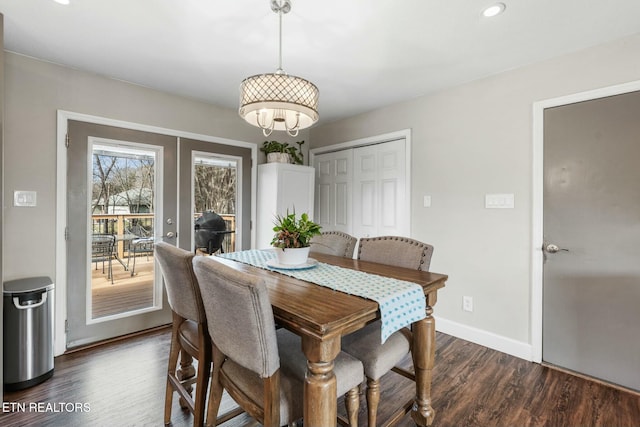 dining space featuring dark hardwood / wood-style floors and french doors