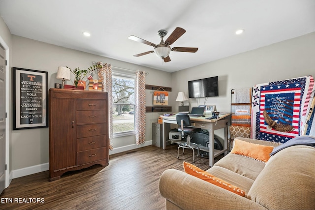 home office featuring ceiling fan and dark hardwood / wood-style flooring