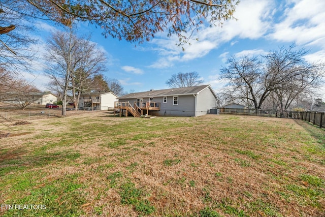 view of yard with a deck