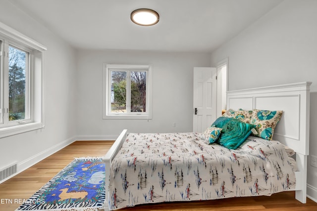 bedroom featuring hardwood / wood-style flooring