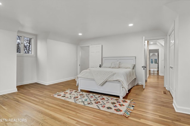 bedroom featuring light wood-type flooring