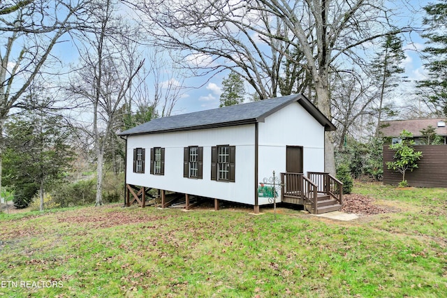 view of outdoor structure with a lawn