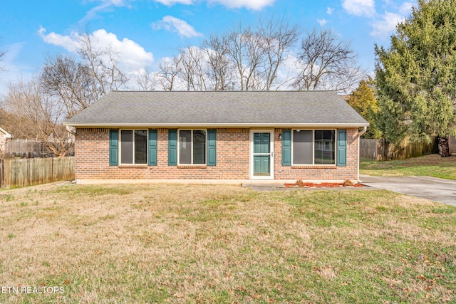 ranch-style house with a front lawn