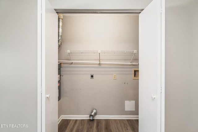 washroom featuring hookup for a washing machine, electric dryer hookup, and dark hardwood / wood-style floors