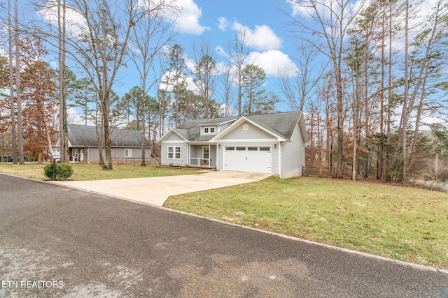 view of front facade featuring a garage and a front yard