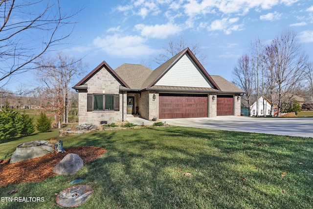 view of front facade with a garage and a front lawn