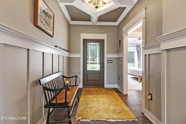 foyer entrance featuring coffered ceiling, crown molding, dark hardwood / wood-style flooring, and beam ceiling