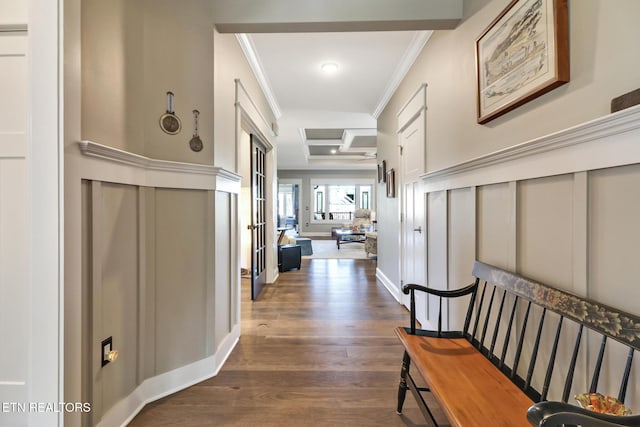 hallway featuring ornamental molding and dark wood-type flooring