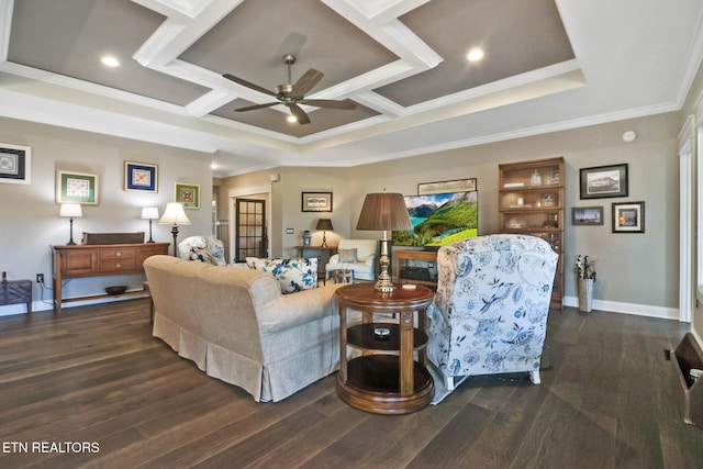 living room with coffered ceiling, ornamental molding, dark hardwood / wood-style floors, and ceiling fan