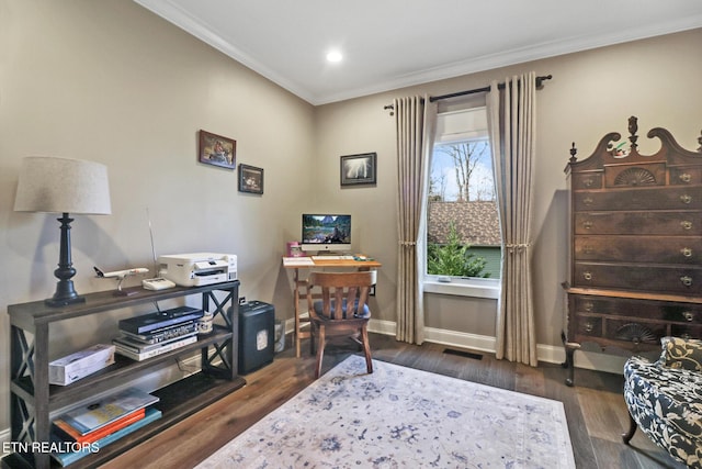 office space featuring crown molding and dark hardwood / wood-style floors