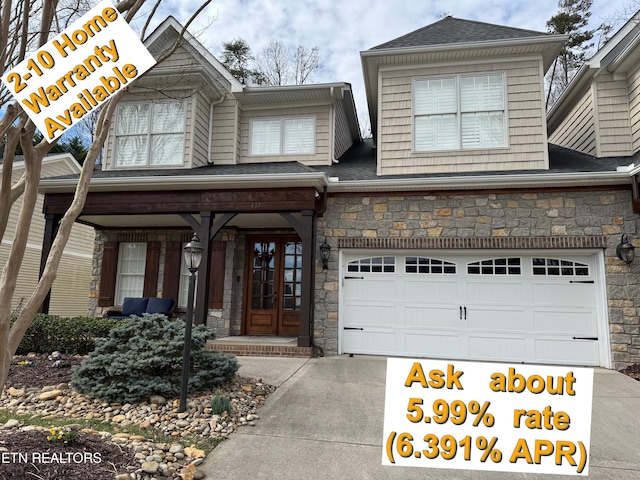 437 Grove Branch Ln, Knoxville, TN 37922 - view of front of home featuring driveway, french doors, and stone siding