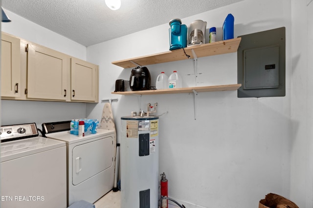 clothes washing area featuring washer and dryer, water heater, cabinets, electric panel, and a textured ceiling