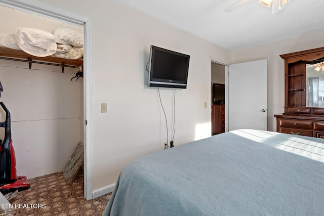 bedroom featuring ceiling fan