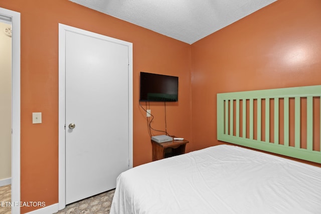 bedroom with a textured ceiling